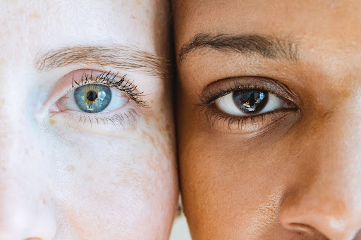 Close up of 2 womens face's side by side