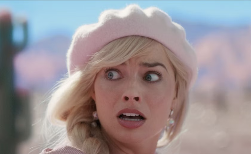 A scene from The Barbie movie, where Margot Robbie looks backward in shock.
